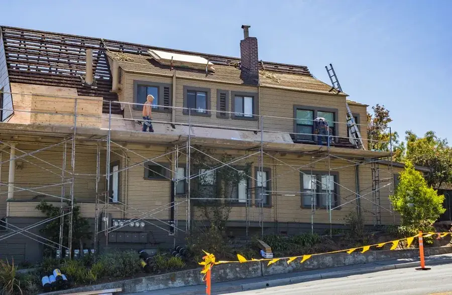 West Coast Roofing team working on a roof in Swansea
